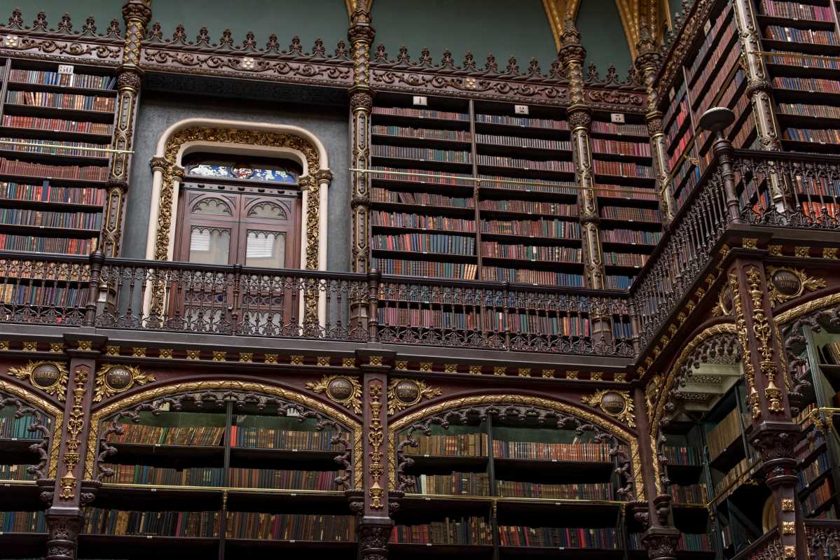 Adding Rolling Ladders to Tall Bookshelves for Function and Style